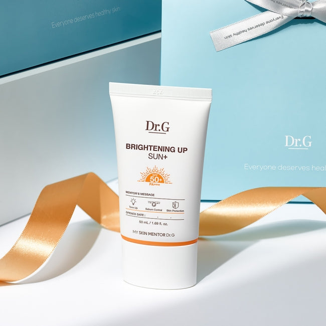 Dr.G Brightening Sun Up Plus 50ml sunscreen cream with elegant packaging on display