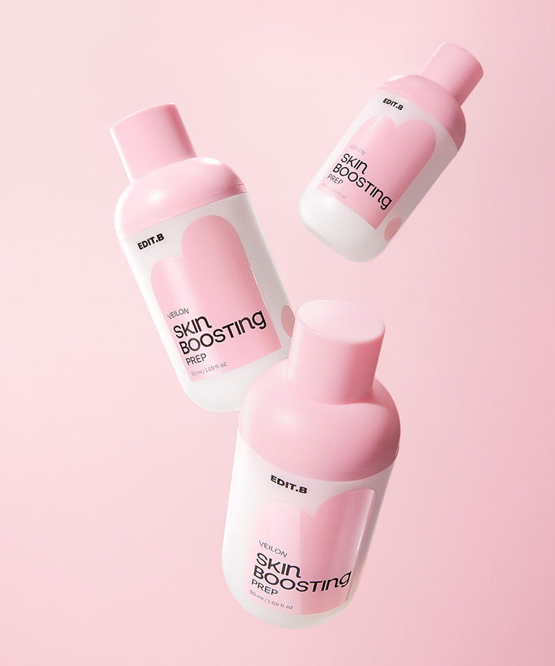 Three bottles of EDIT.B Veil On Skin Boosthing Prep 50ml against a pink background, showcasing the skincare product's packaging.