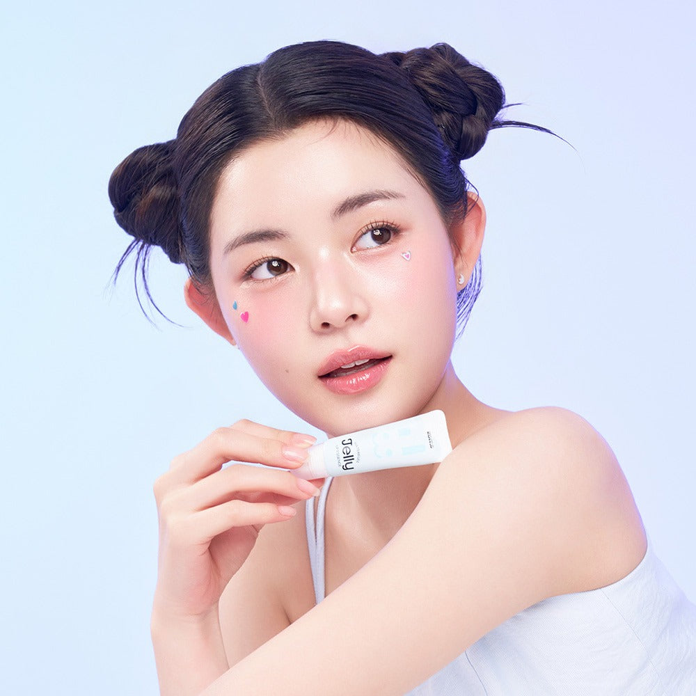 Woman holding EDIT.B Waterful Jelly Lip Essence 11ml, showcasing moisturizing lip care product.