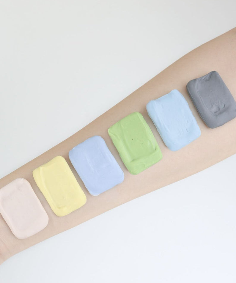 ELIZAVECCA Modeling Pack Face Mask 6 Types displayed on an arm, showcasing diverse colors for beauty treatment.