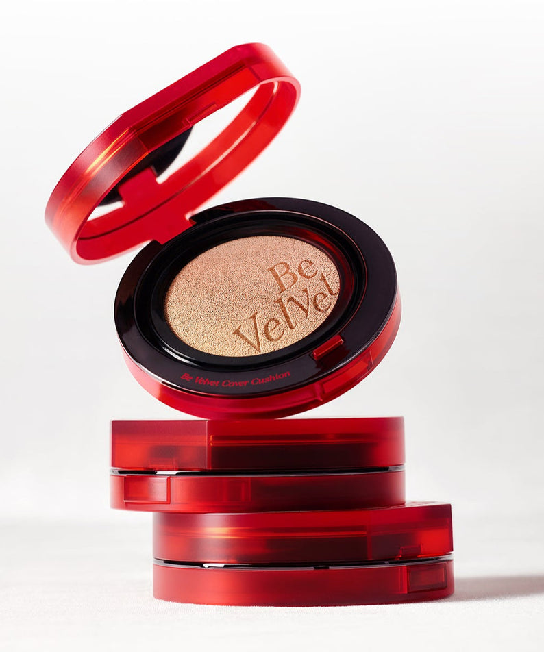 Red ESPOIR BE VELVET COVER CUSHION SPF42 PA++ compact open showing product, stacked with closed compacts on white background.