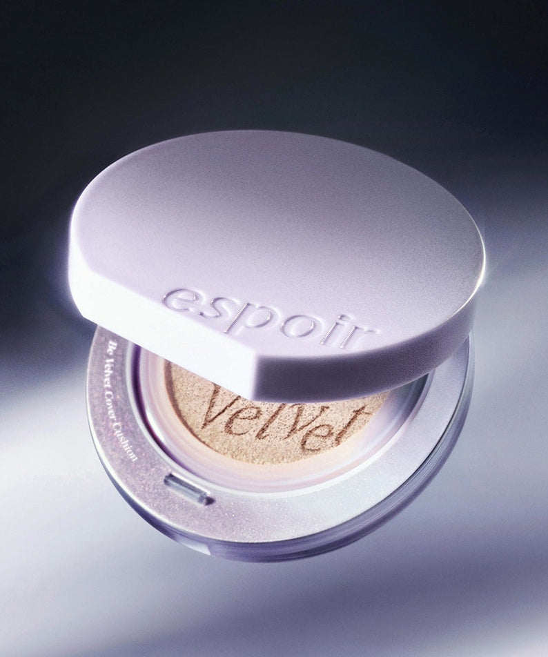 ESPOIR Bevelvet Cover Cushion SPF42 PA++ [Galaxy Beam Collection] compact with sleek design in soft lighting.