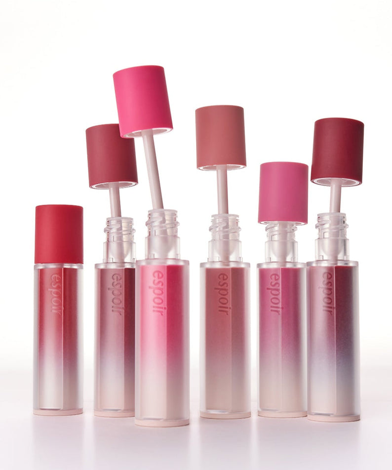 ESPOIR Couture Lip Tint Fitting Blur collection showcasing a variety of vibrant shades in sleek, modern packaging.