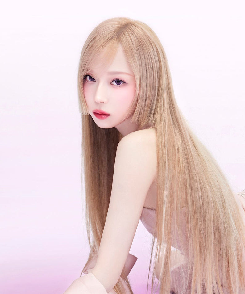 Model showcasing ESPOIR Couture Lip Tint Glaze with long straight hair and pink backdrop