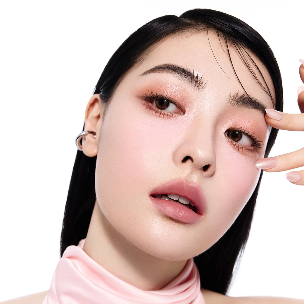 Model using ESPOIR Eye opening pencil for a radiant eye look, showcasing the product's enhancing effect.