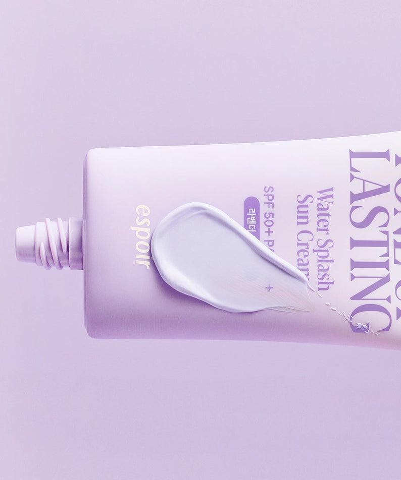 ESPOIR Water Splash Sun Cream Tone Up Lasting SPF 50+ PA++++ tube with cream on a purple background.
