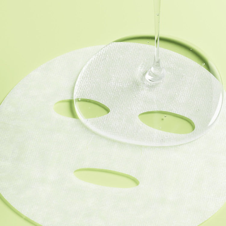 ESSENHERB Kummerowia Poresetting Cotton Mask 5EA showing close-up of mask texture and liquid application.