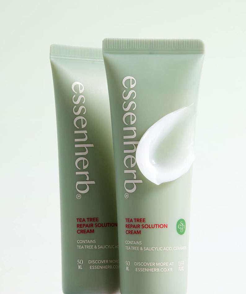 ESSENHERB Tea Tree Repair Solution Cream 50ml tubes with lotion swatch on packaging