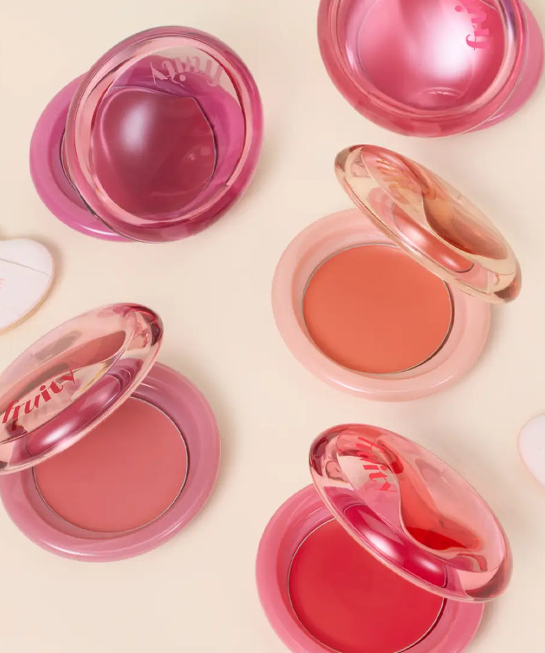 Assorted shades of ETUDE Fruity Lip & Cheek Blur Balm 2.3g open on a light background.