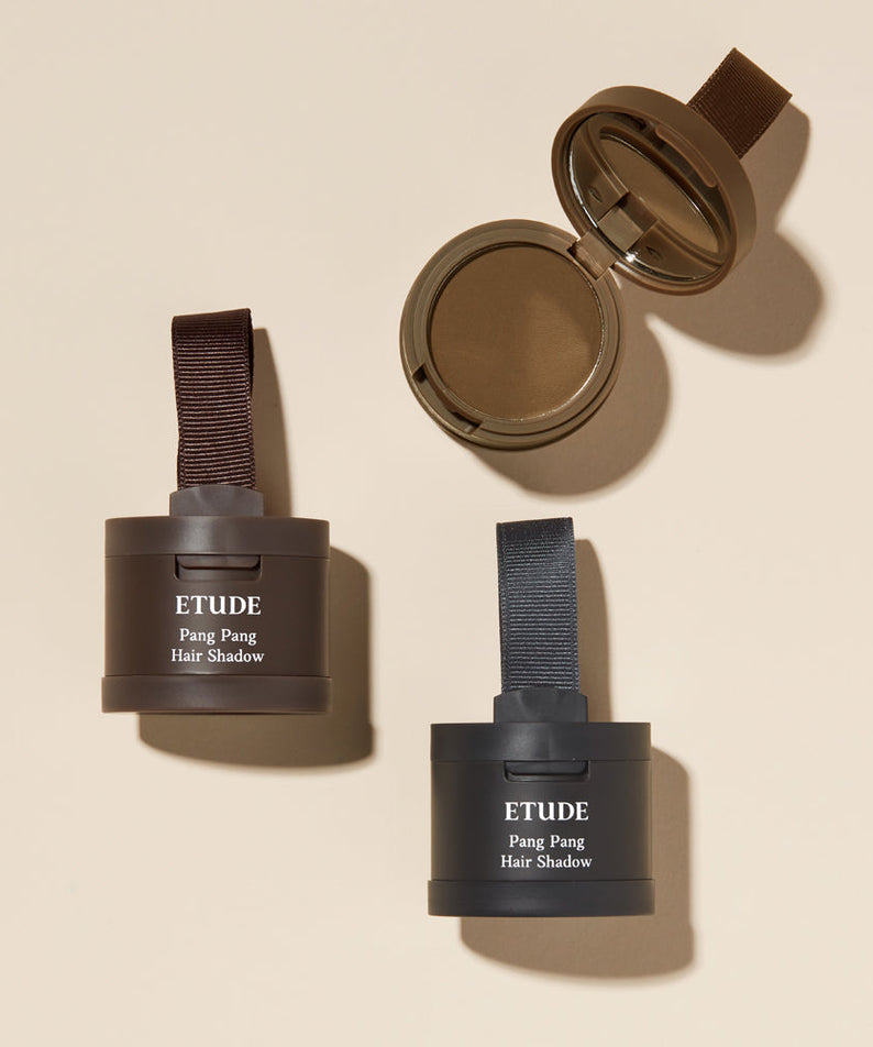 ETUDE Pang Pang Hair Shadow products displayed on a beige background.