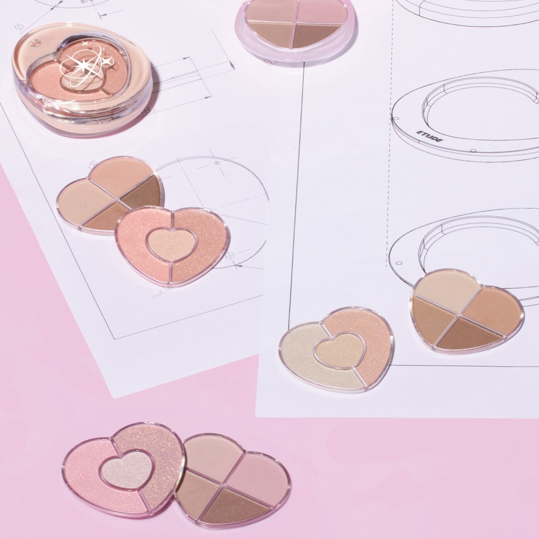 ETUDE Poyong Eye Maker heart-shaped eyeshadow palettes displayed on pink background with design sketches.