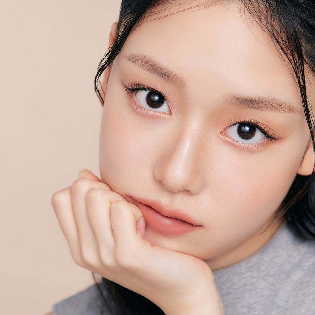 Model showcasing makeup applied with ETUDE Re-creation Maker Aegyo-sal Liner for enhanced eye beauty.