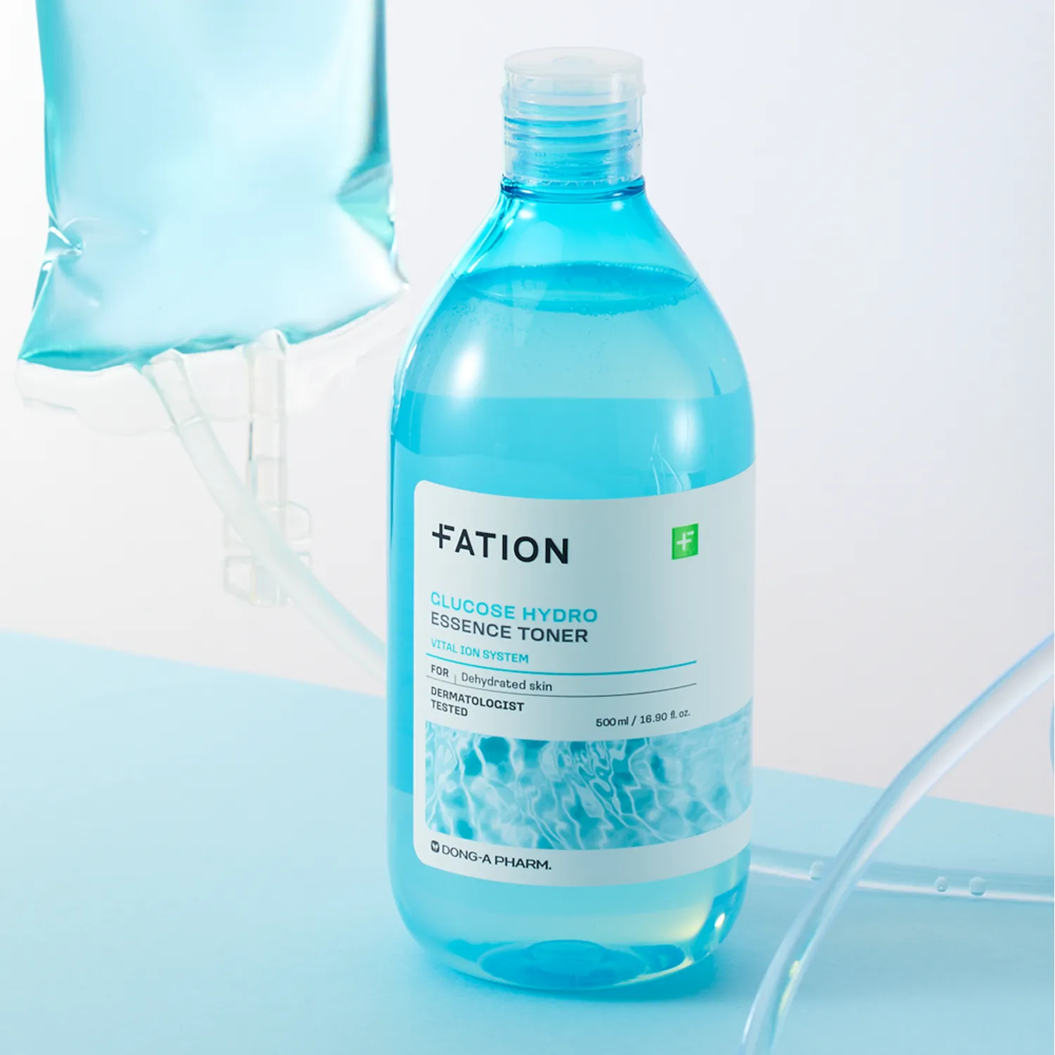 FATION Glucose Hydro Essence Toner 500ml bottle on a light blue background, designed for dry and dehydrated skin care routine.