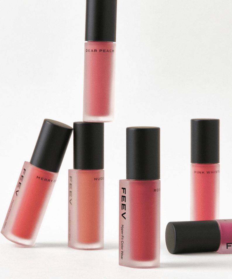 FEEV Hyper-Fit Color Wear Tint collection showcasing various shades of lip tint in sleek packaging.