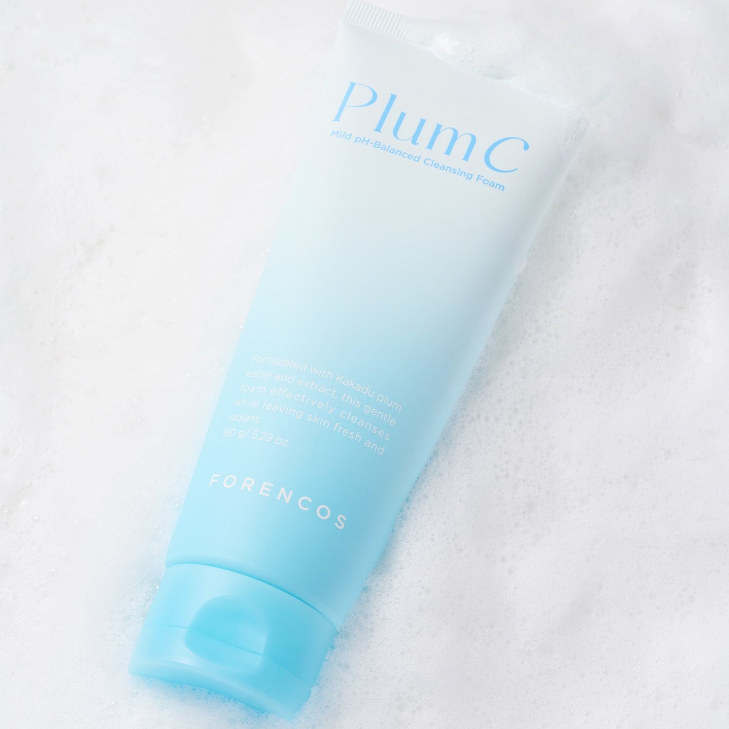 FORENCOS Plum C Mild Mild Acidic Cleansing Foam 150g tube on a bubbly surface.