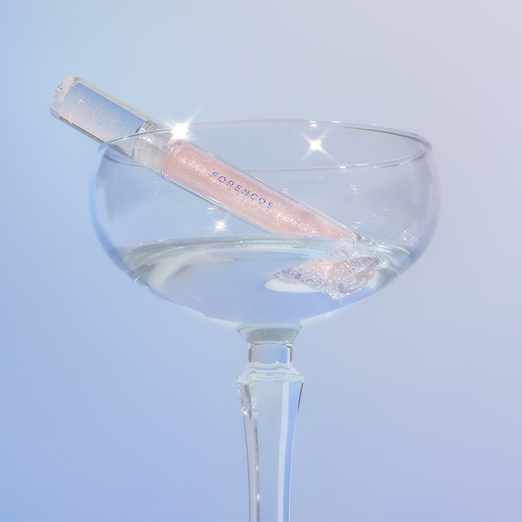 FORENCOS Starlight Liquid Glitter luxury design displayed in an elegant glass setting, showcasing its shimmering effect.