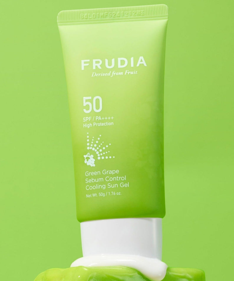FRUDIA Green Grape Sebum Control Cooling Sun Gel 50g tube on green background.