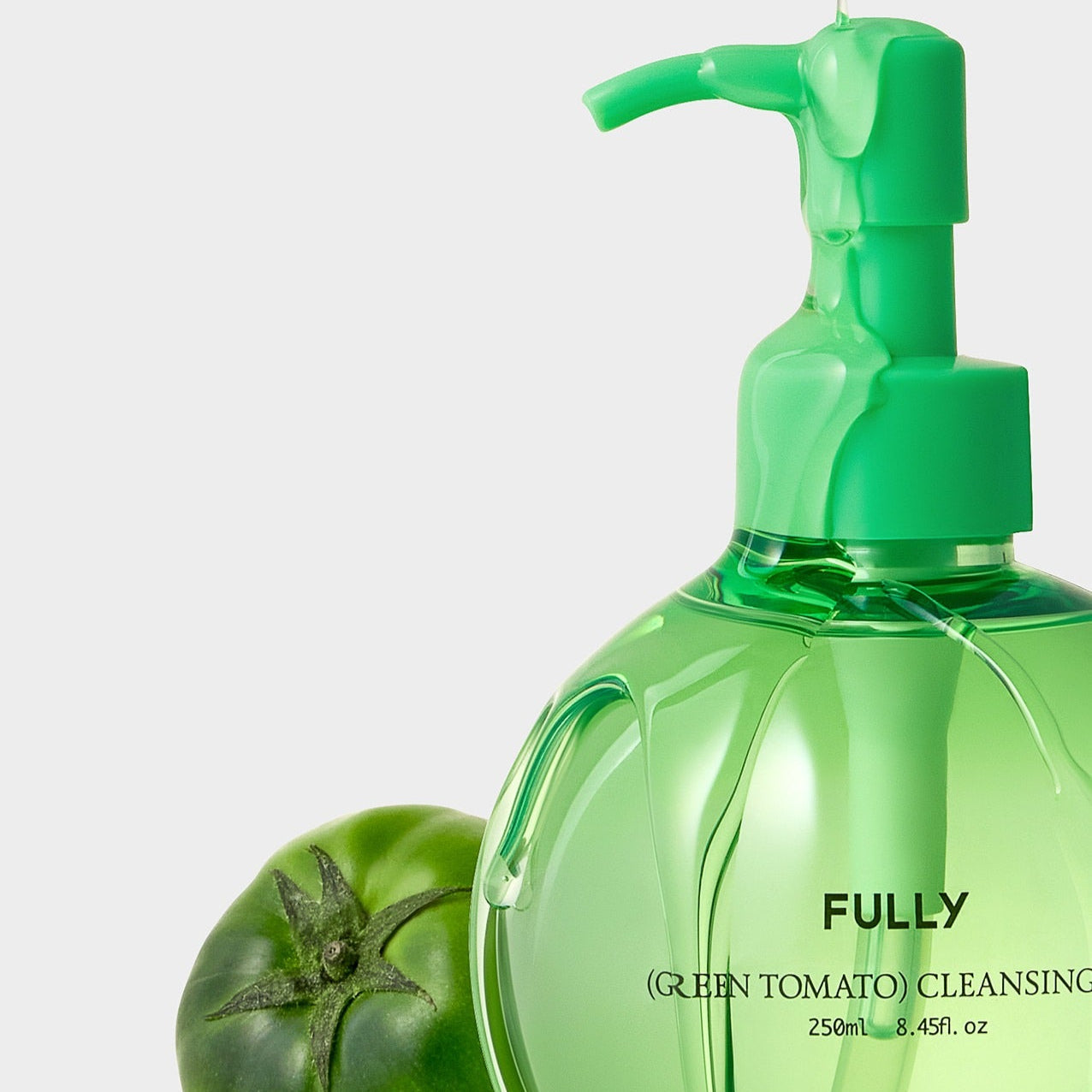 FULLY Green Tomato Cleansing Oil 250ml bottle with green tomato, skincare product.