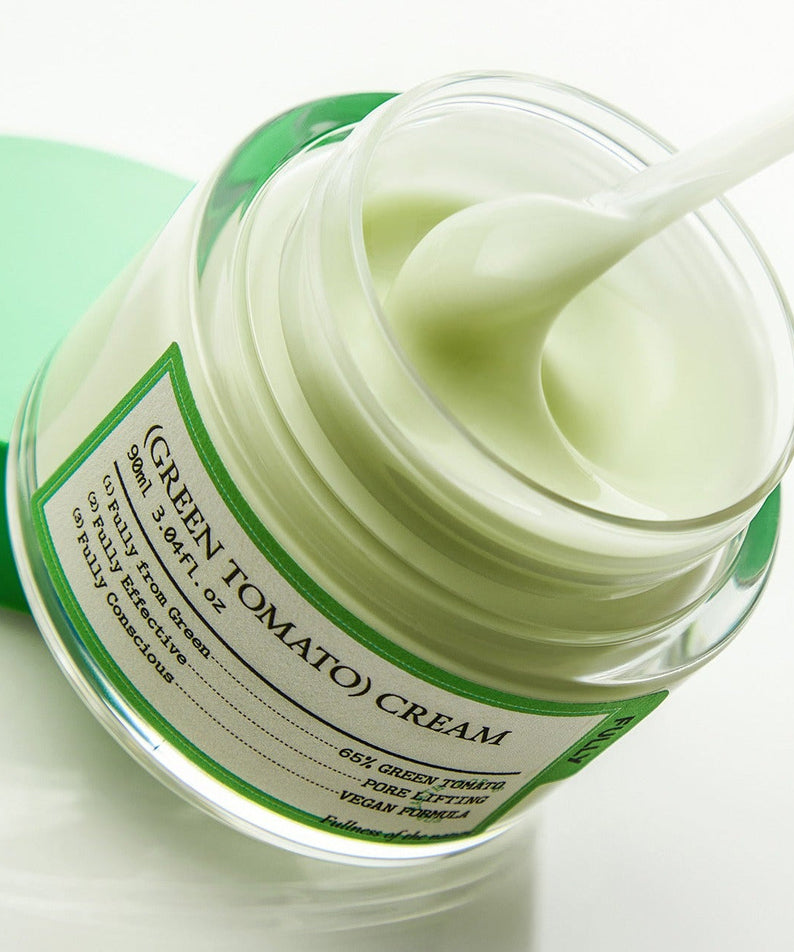 Open jar of FULLY Green Tomato Cream 90ml with a close-up of the smooth green cream and product label.