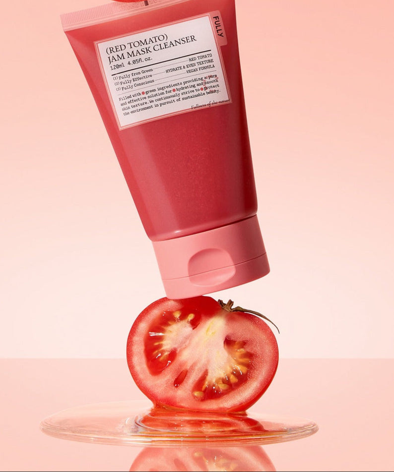 FULLY Red Tomato Jam Pack Cleanser 120ml on a sliced tomato, pink background