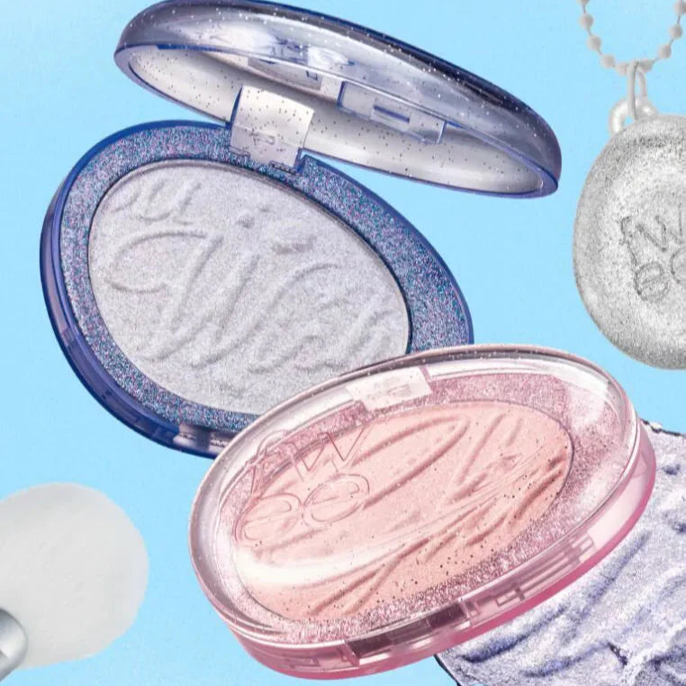 FWEE Glitz Stone Highlighter in shimmering shades with compact case and brush accessory, perfect for a radiant glow.