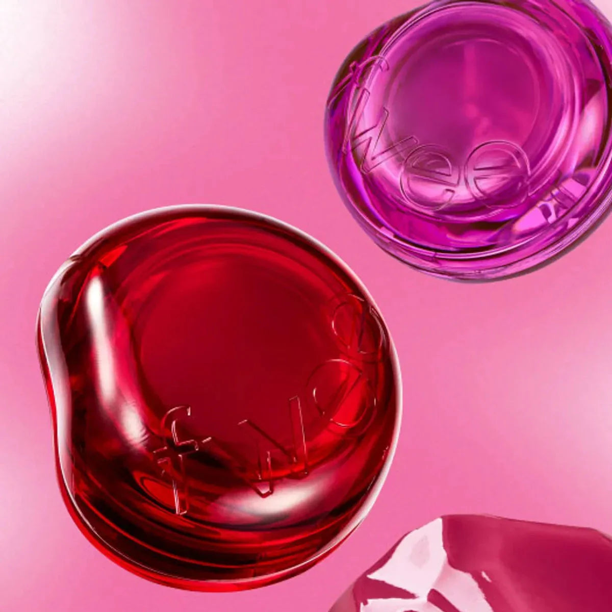 FWEE Lip & Cheek Glowy jelly Pot with vibrant red and purple shades, perfect for adding a pop of color to lips and cheeks.
