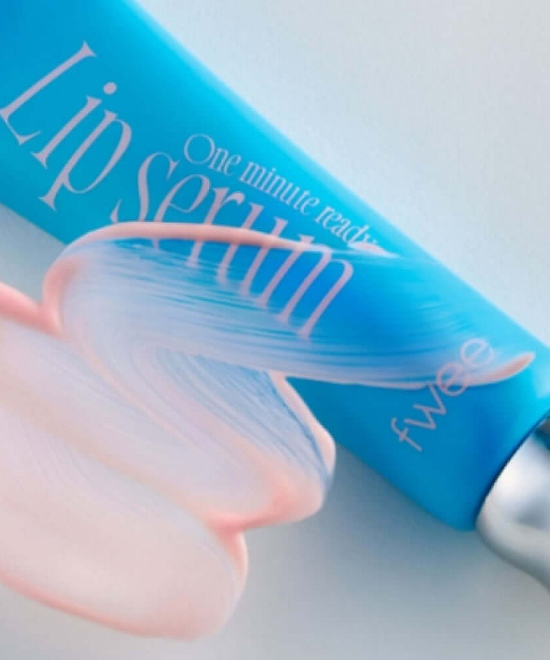FWEE One Minute Ready Lip Serum in blue tube with creamy texture, designed for quick lip care and nourishment.