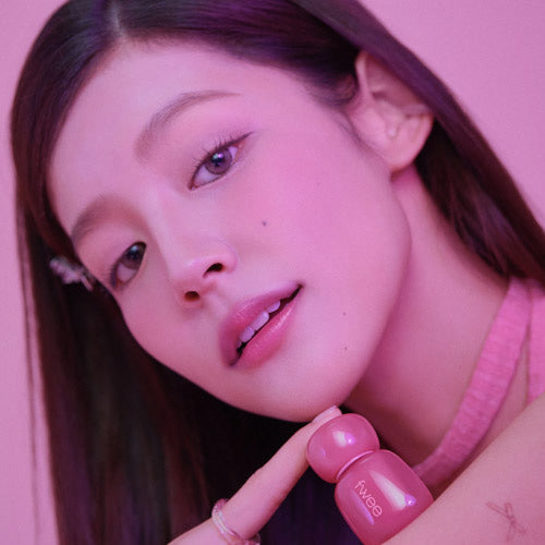 FWEE Pink Obsession Stay Fit Tint displayed by model in pink setting