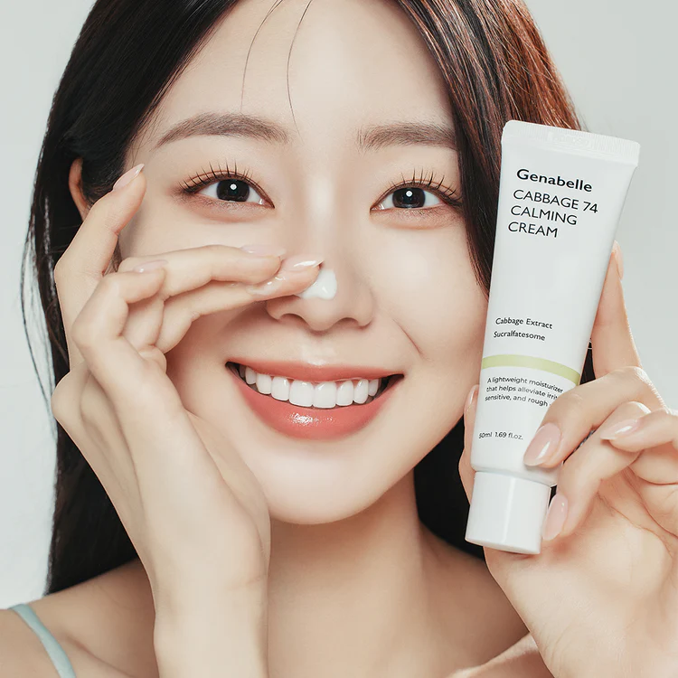 Smiling person applying GENABELLE Cabbage 74 Calming Cream 50ml for relaxed and refreshed skin