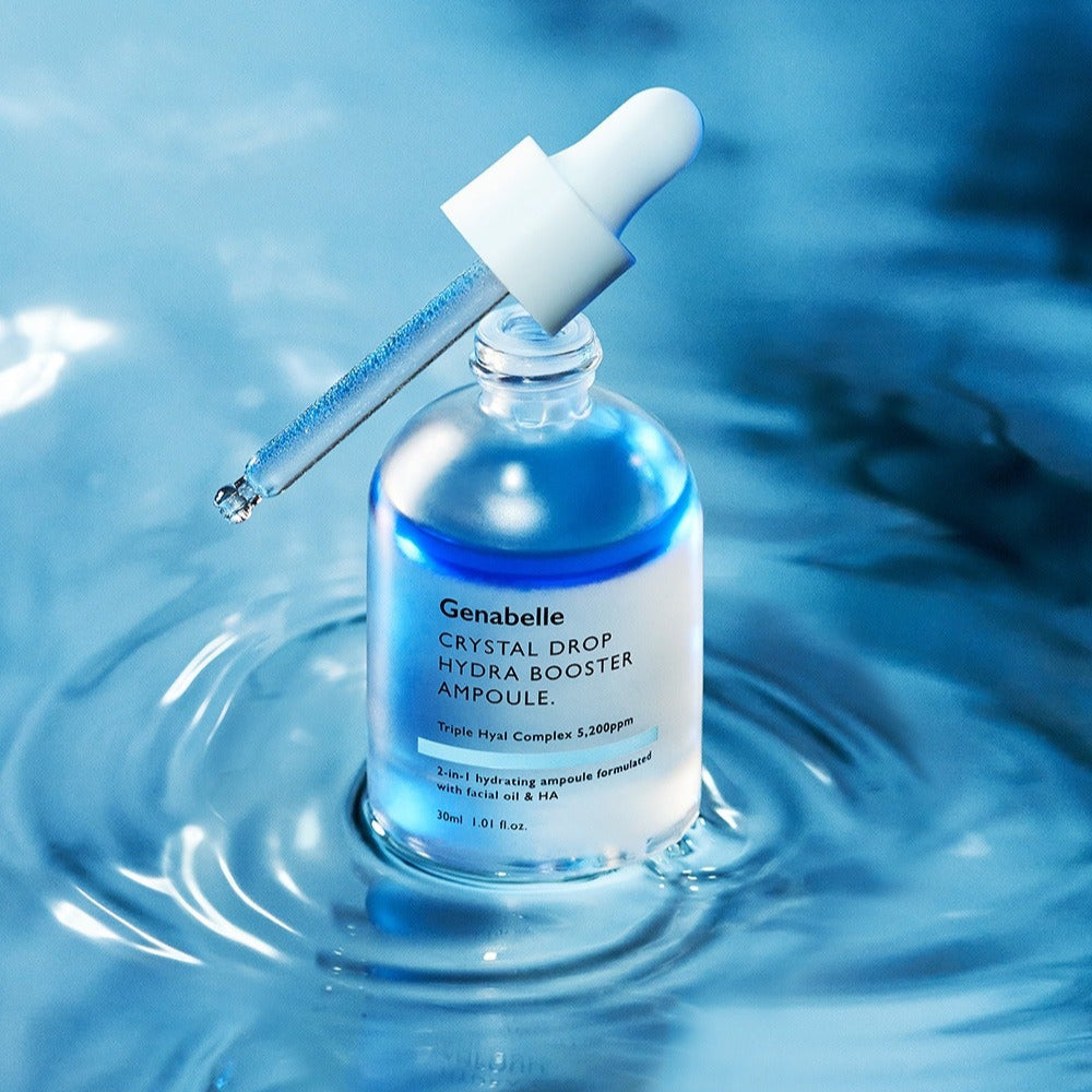 GENABELLE Crystal Drop Hydra Booster Ampoule 30ml with dropper in a serene water setting, highlighting its hydrating properties.