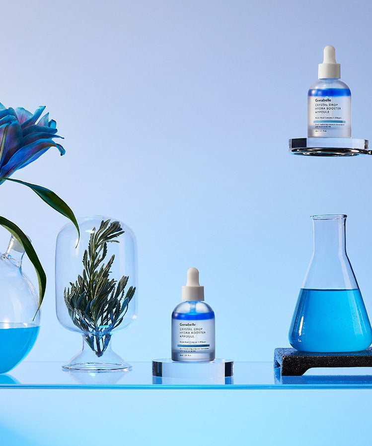 GENABELLE Crystal Drop Hydra Booster Ampoule 30ml with lab-themed aesthetic and botanical elements.