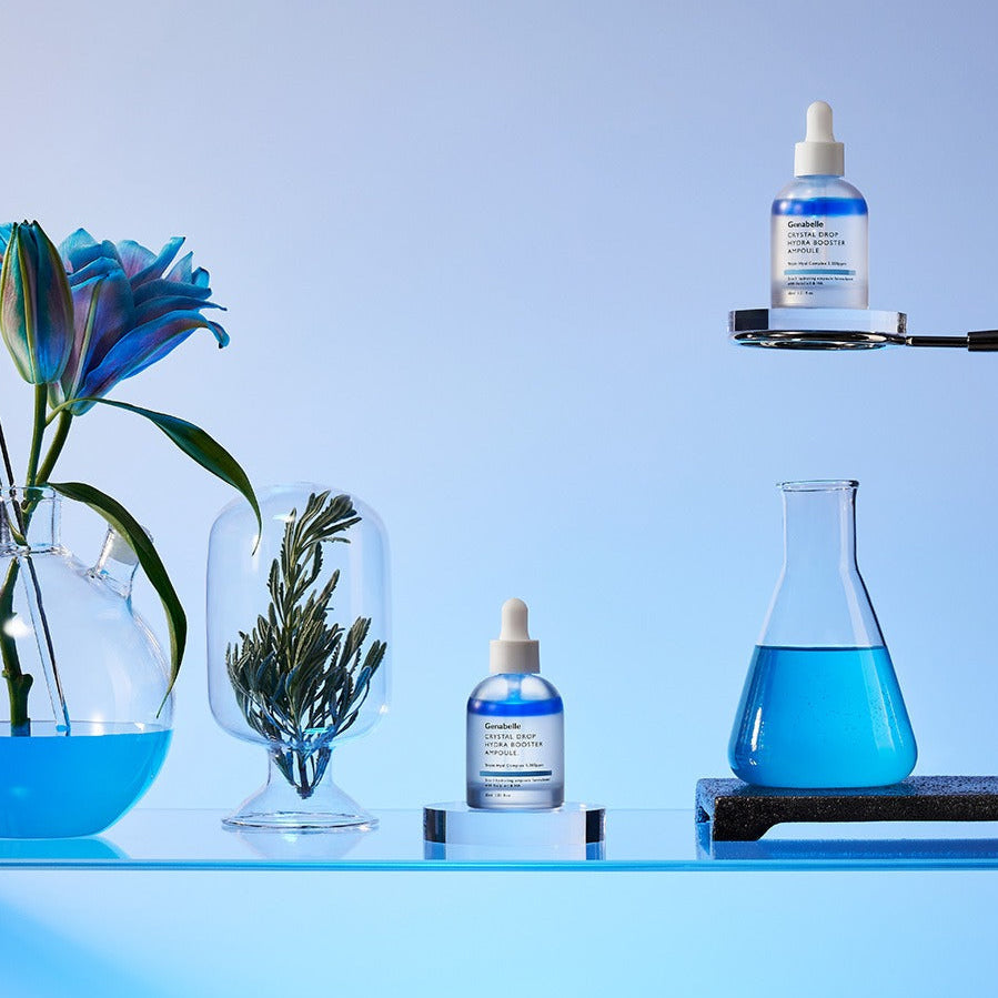 GENABELLE Crystal Drop Hydra Booster Ampoule 30ml with lab-themed aesthetic and botanical elements.