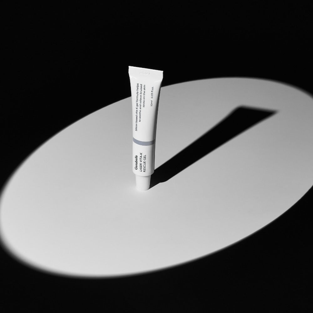 GENABELLE Laser Vita-K Rescue Gel 10ml skincare product in focus on a dramatic black and white background.