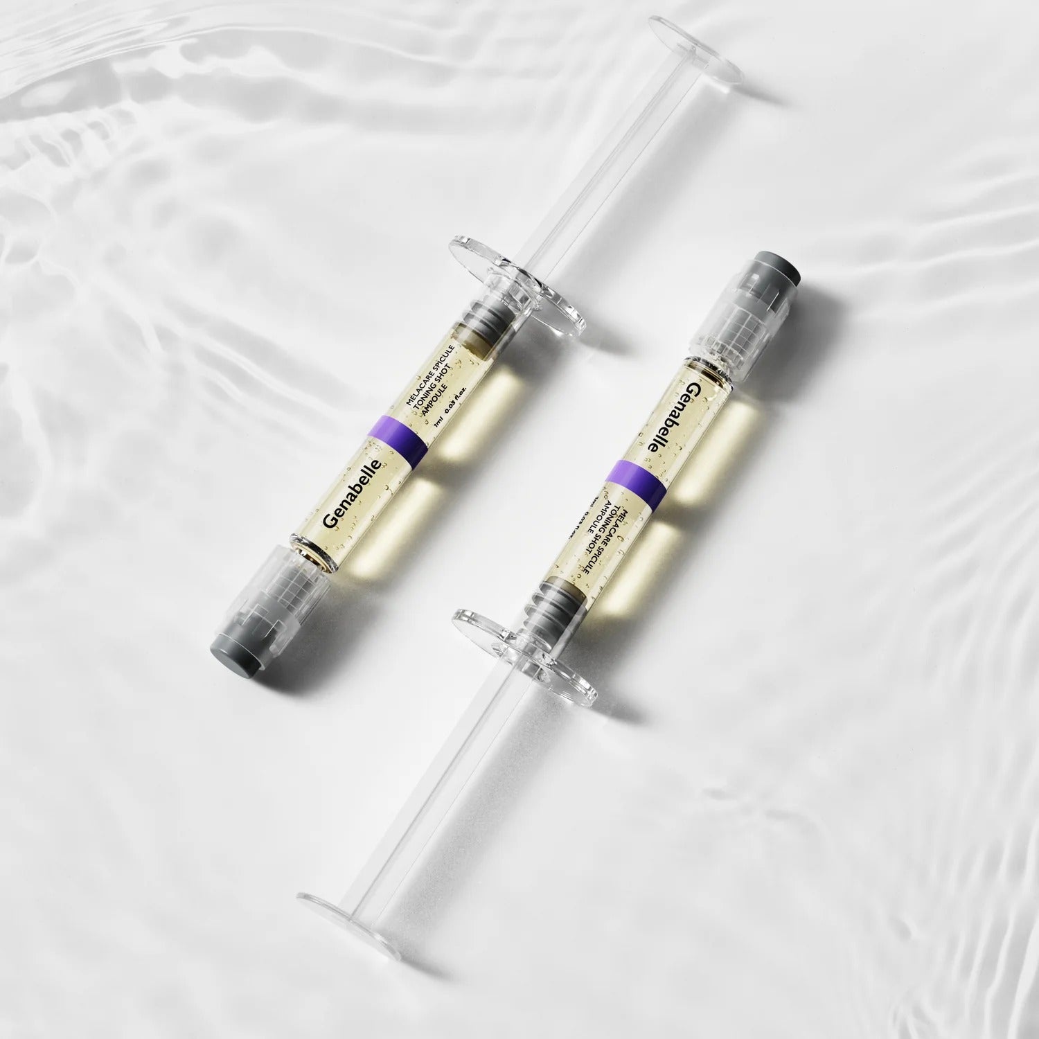 GENABELLE Melacare Spicule Toning Shot Ampoule 3ea displayed on a rippled water surface.