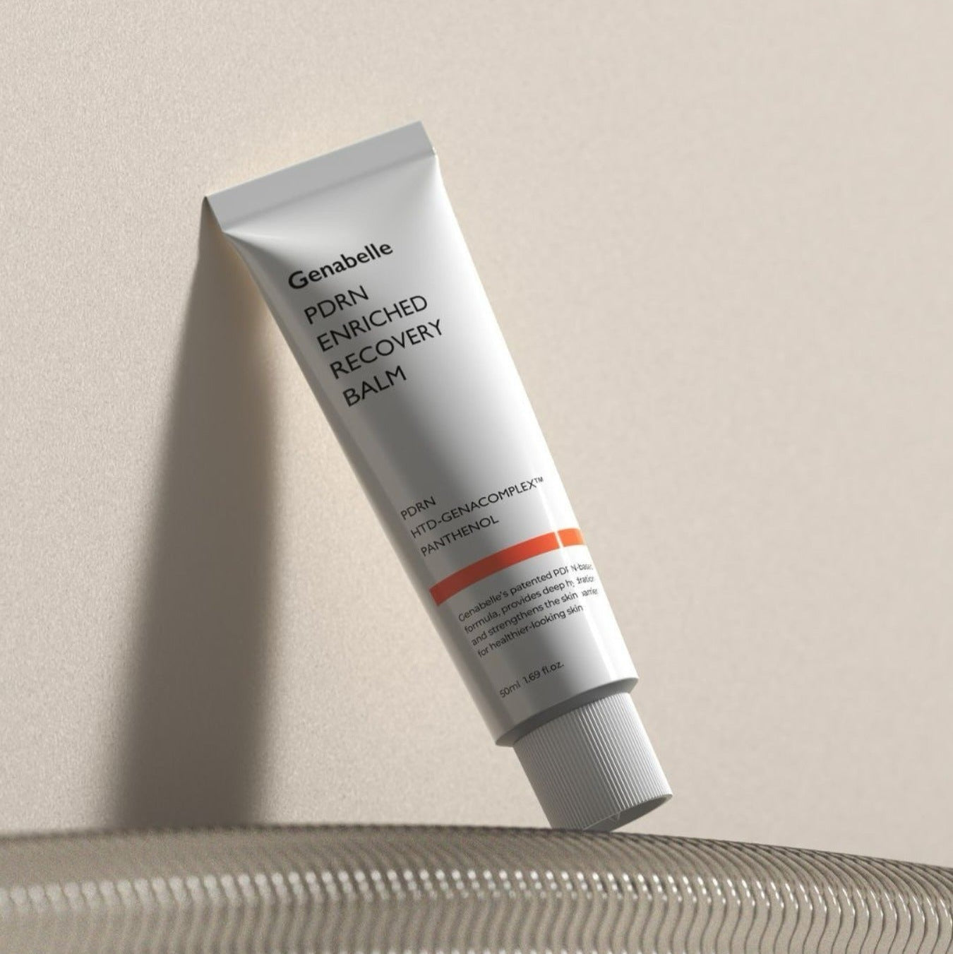 GENABELLE PDRN Enriched Recovery Balm 50ml tube on a textured surface, featuring nourishing skincare benefits and healing properties.