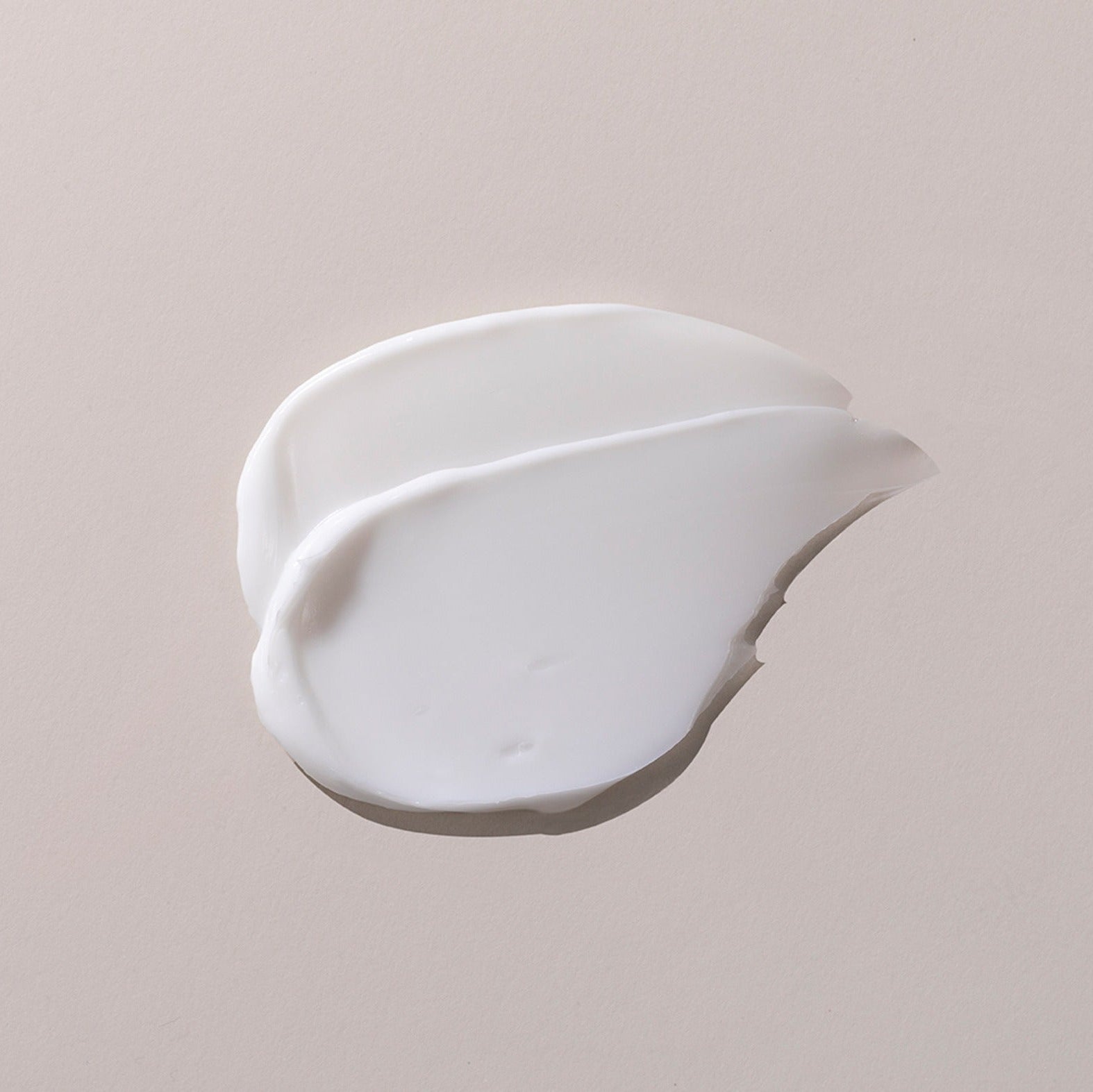 Texture of GENABELLE PDRN Rejuvenating Cream 70ml on neutral background