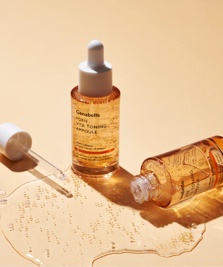 GENABELLE PDRN Vita Toning Ampoule 70ml with pipette and spilled liquid on a beige surface