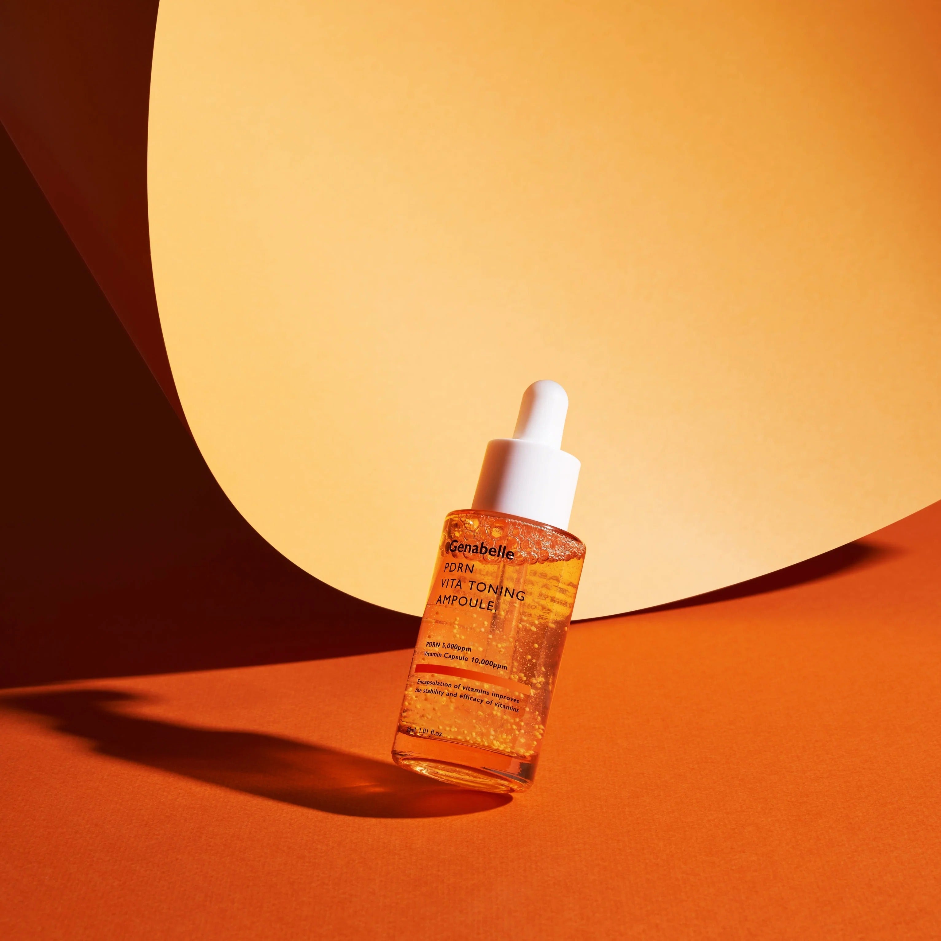 GENABELLE PDRN Vita Toning Ampoule 70ml product image with orange backdrop.