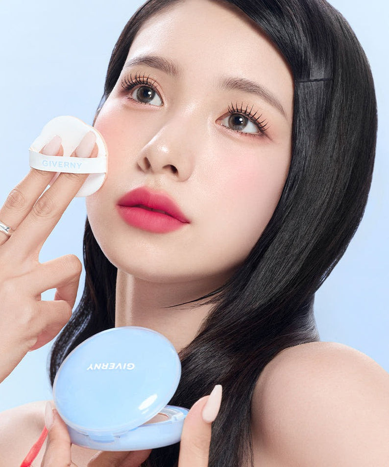 Woman applying GIVERNY Cloud Mesh Cushion 15gX2 (Main Product + Refill) (SPF 40, PA++) for a flawless complexion look.