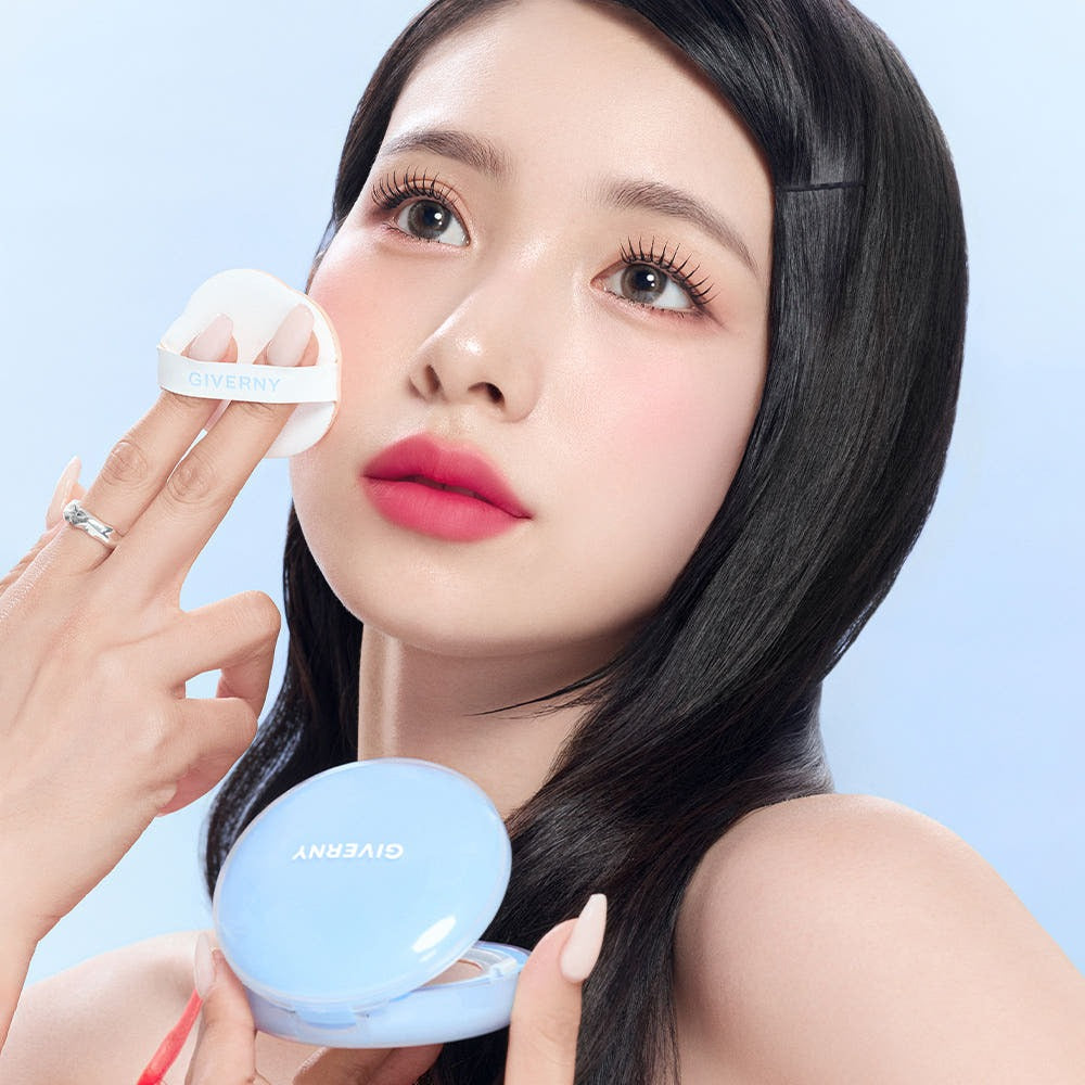 Woman applying GIVERNY Cloud Mesh Cushion 15gX2 (Main Product + Refill) (SPF 40, PA++) for a flawless complexion look.