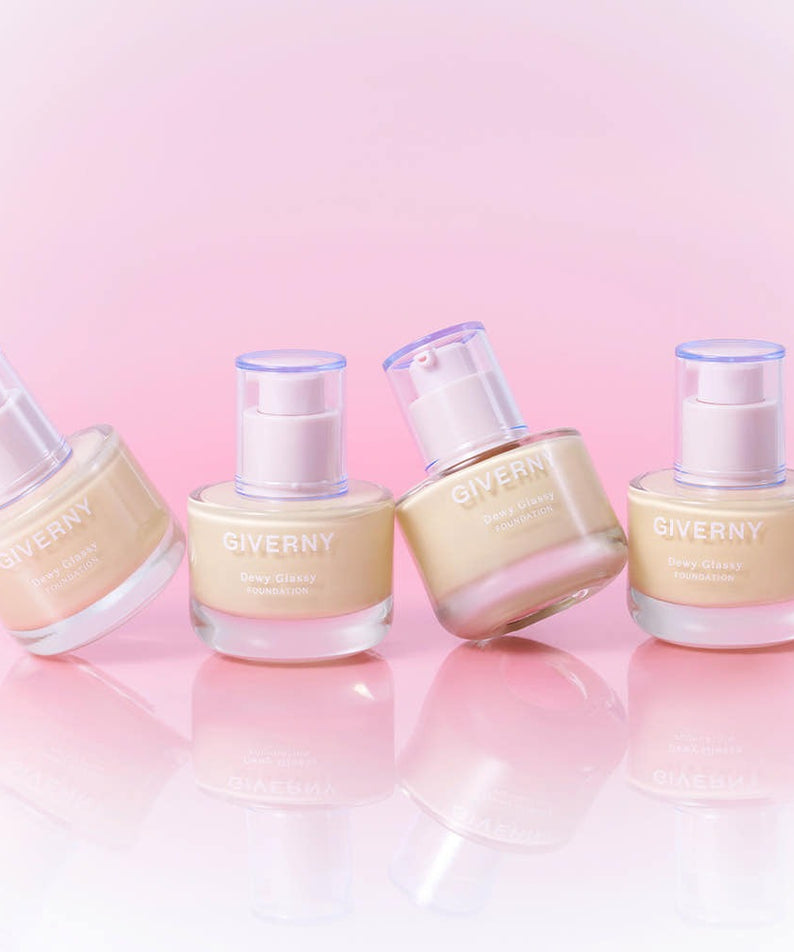 GIVERNY Dewy Glassy Foundation 30ml (SPF38, PA++) bottles against a pink background, showcasing luxurious skincare makeup.