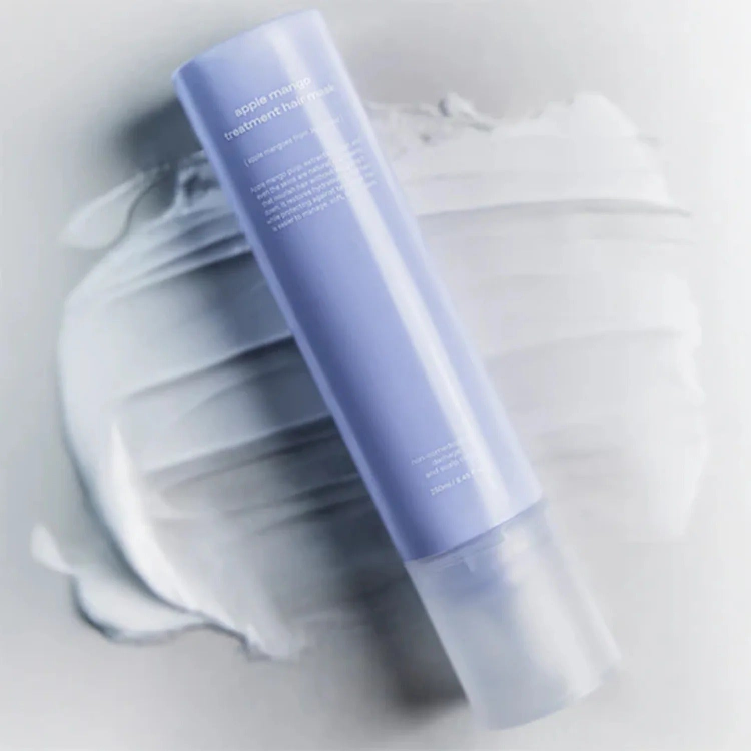 GLOW Apple Mango Hair Treatment 250ml on a white textured background.