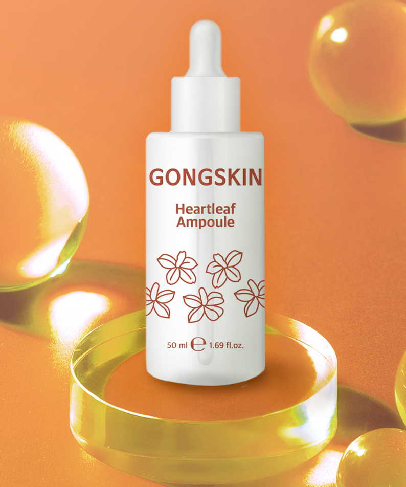 GONGSKIN Heartleaf Ampoule 50ml on orange background with dewy effect showcasing skincare product