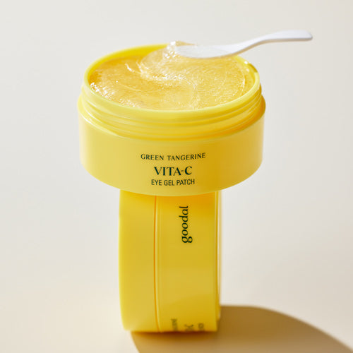 GOODAL Green Tangerine Vita C Eye Patch 60p in yellow jar with applicator on top, showcasing product texture and packaging.