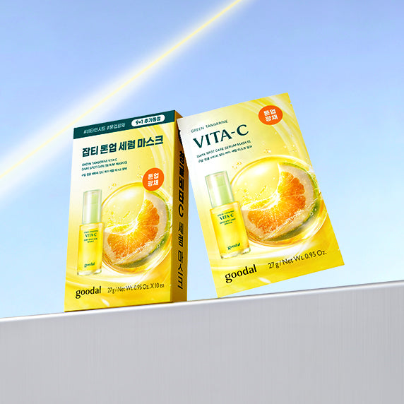 Packaging of GOODAL Green Tangerine Vita C Spot Care Serum Mask Alpha 5 Sheets displayed against a clear sky background