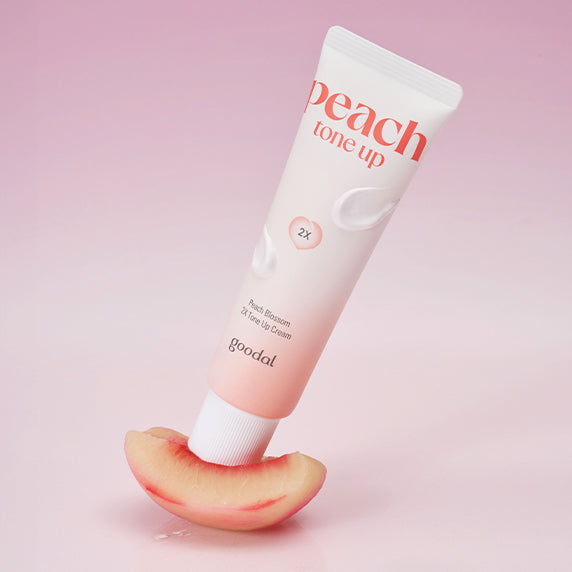 GOODAL Peach Blossom 2x Tone Up Cream 50ml with slice of peach on pink background