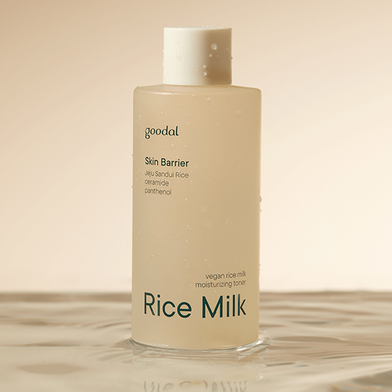 GOODAL Vegan Rice Milk Moisturizing Toner 250ml bottle on a reflective surface with soft lighting