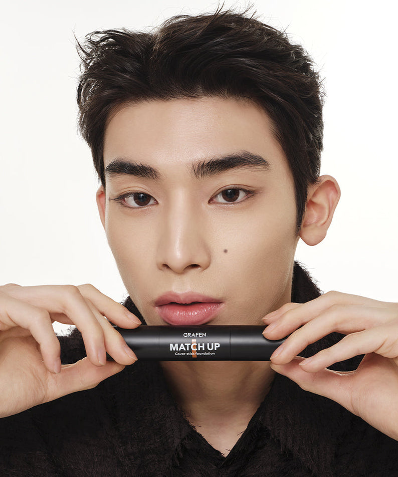 GRAFEN Match Up Cover Stick Foundation 12g held by male model - Gentleman Korea product image for Korean men’s skincare