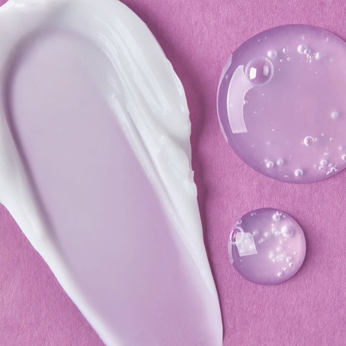 Texture of HANSKIN Collagen Peptide Hydra Ampoule 90ml showcasing cream and gel forms on pink background.