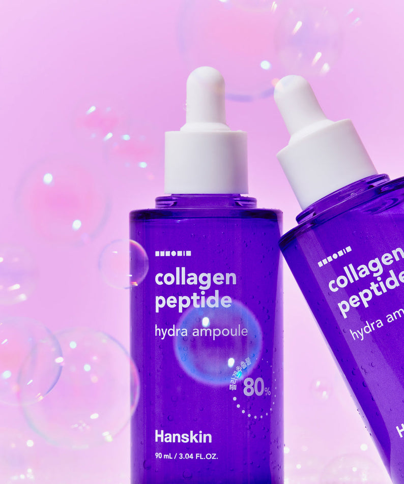 HANSKIN Collagen Peptide Hydra Ampoule 90ml on pink background with bubbles, showcasing skincare product design and packaging.
